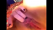 girl fingers her pussy
