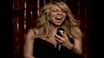 Petit clip vidéo de Mariah Carey yo g portant soutien-gorge et e culotte blanche