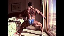 Huge Bodybuilder Flexing in Hotel Room