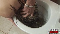 Blondie takes a facial in the toilet