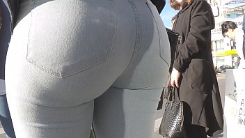 Candid ass in skin tight light blue jeans