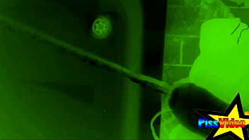 Pissing in the shower in the dark and filmed with night vision devices