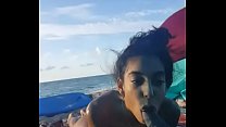 Claire Black Sucks Large Cock on the Beach
