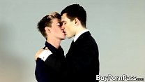 Muscular man in a suit makes cute twink cum from anal sex