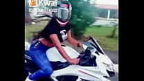 hot brunette riding a motorcycle
