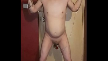 bisexual amateur humiliates himself on cam while wrist cuffed and anal hooked in bdsm giving himself electro cock t.