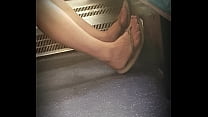 Candid feet in Flip Flops on train London Uk