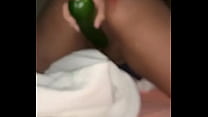 23 year old girl touching herself with a cucumber, very hot
