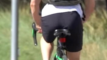 very short view, but worth it, perfect ass of sexy guy in bicycle in the background
