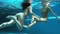 Jessica and Lindsay swim naked in the pool