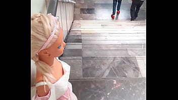 Giant barbie at the subway