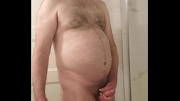 Nude Martin Lavallée mastubates, ejaculates and eats his sperm