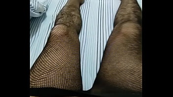 Transvestite girl with fishnet pantyhose