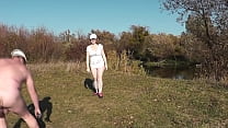 Wild beach. Nude in public. Outdoor on bank of river naked sexy MILF Frina learns to play badminton together with her naked lover. Outside. Nudist beach. Pussy natural tits ass Milf