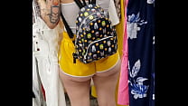 Booty cheeks in yellow shorts