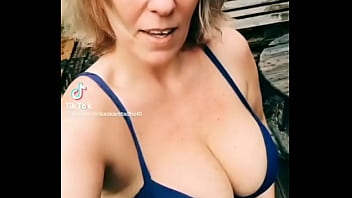 Milf showing her big natural boobs inn a bra
