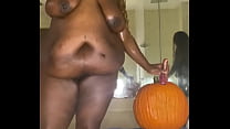Happy Halloween ebony babe rides pumpkin
