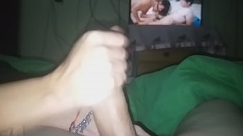 My wife finds me watching porn and decides to jerk me off until she takes my cum